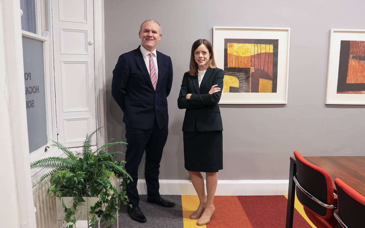 Aileen Gittens Appointed Head of Immigration pictured with John Hickey